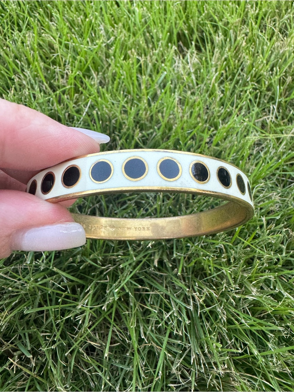 kate spade Gold-Tone White Enamel Bangle with Black Dot Pattern